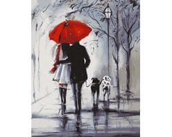 Spacer pod czerwoną parasolką